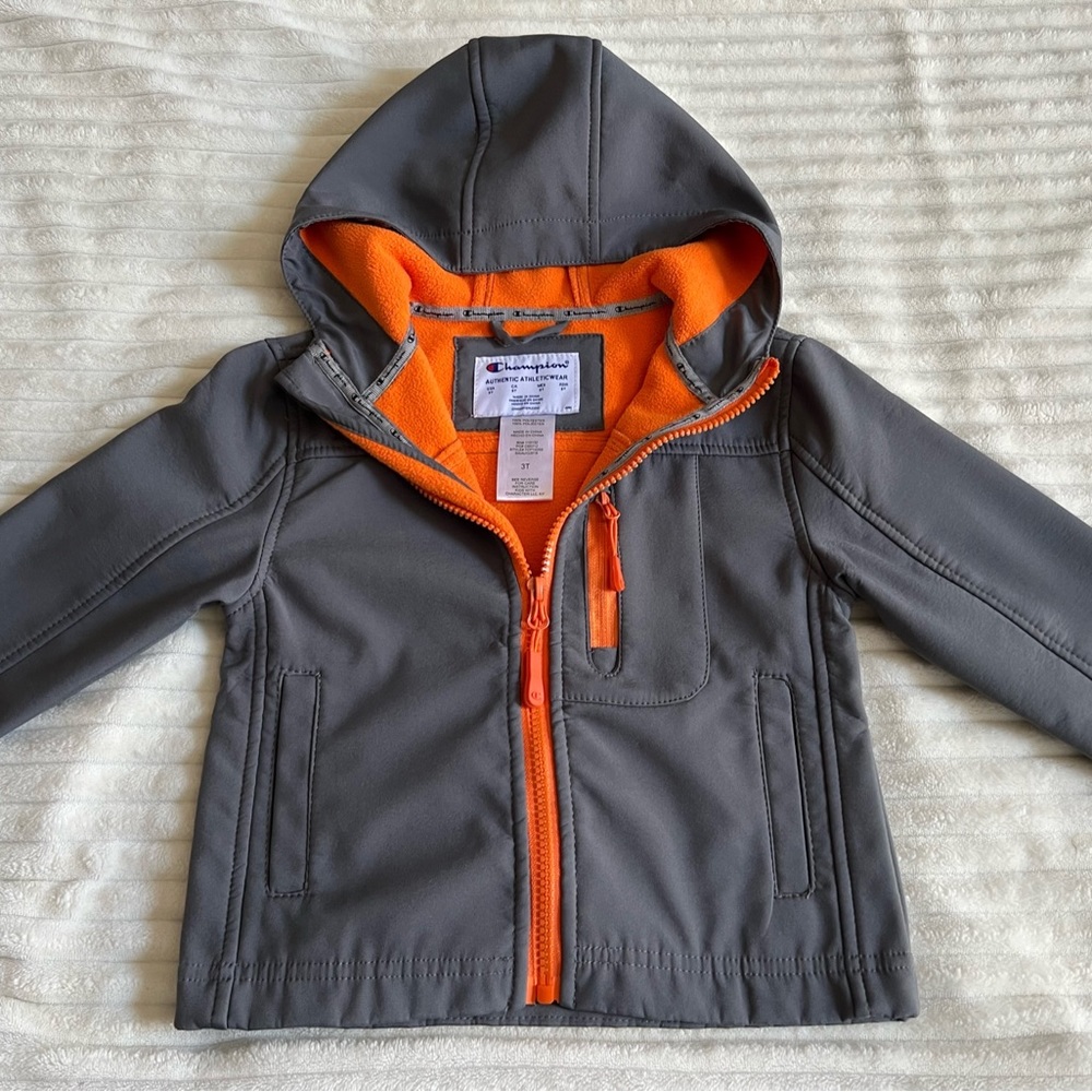 Gray champions Jacket like new. Perfect for a windy day